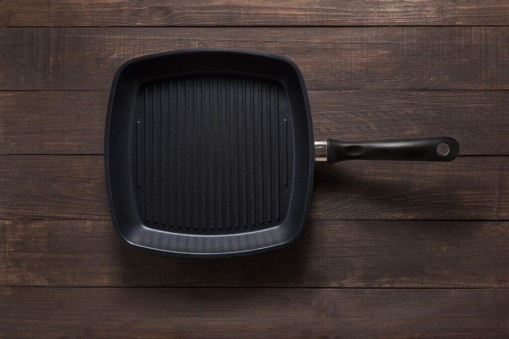 A durable, eco-friendly cast iron griddle pan perfect for healthy, sustainable meals in a natural living kitchen.